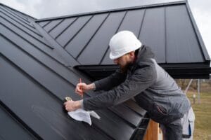 medium-shot-man-working-roof_23-2149343643